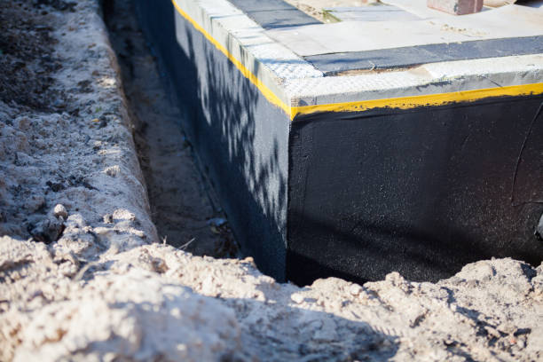 Professional Basement Waterproofing technician working in Richfield, OH